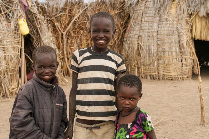 Lopeyo 6, Arukudi 7 and Ewoton 4 at their homestead in Turkana, Kenya.