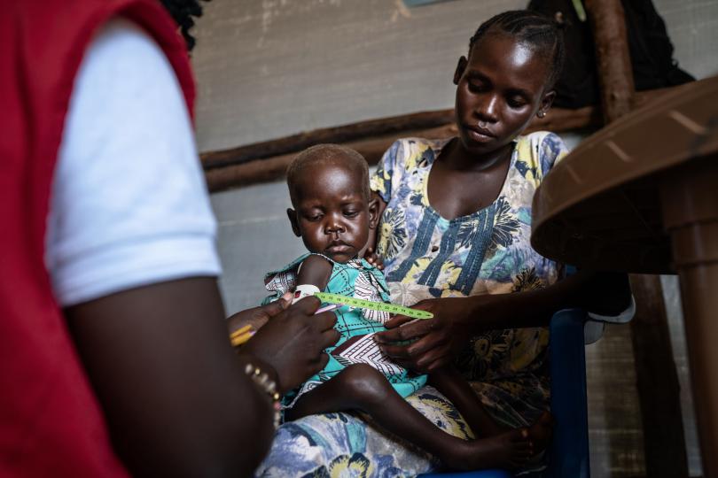 A healthy Phoebe receives a check-up. Frederik Lerneryd / Save the Children