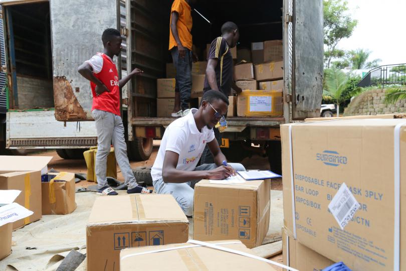 Loading PPE supplies to be distributed across Uganda. Alun McDonald / Save the Children