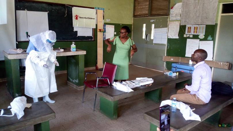 Training on PPE use in western Uganda. Annet Kabasinguzi / Save the Children