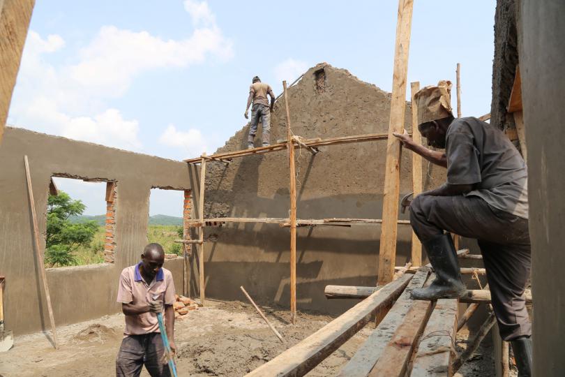 Constructing new classrooms in Rwamwanja refugee settlement. Alun McDonald / Save the Children