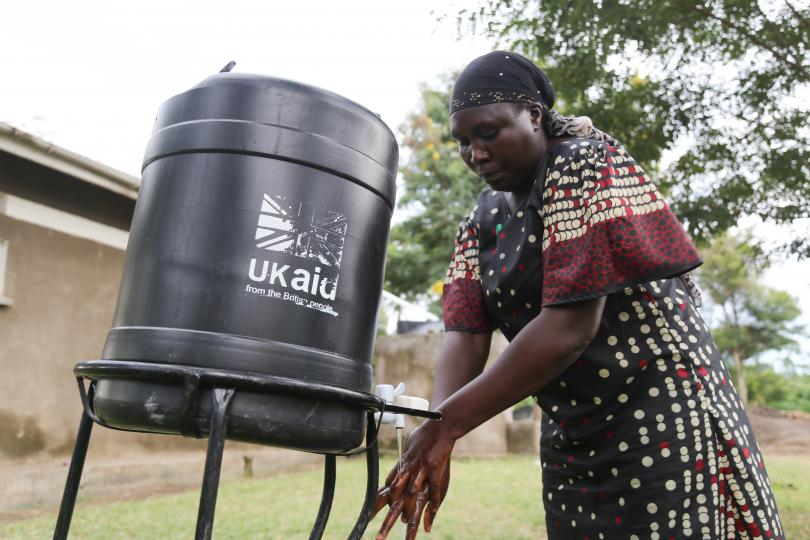 Rashida demonstrates good handwashing techniques. Alun McDonald / Save the Children