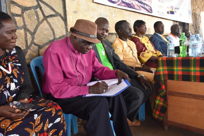 The Anglican Bishop of Kotido signs the pledge