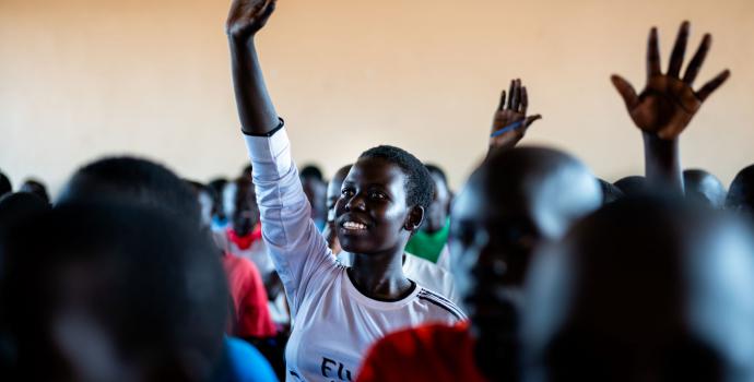 Harriet* at school in a refugee settlement in Uganda. Louis Leeson / Save the Children