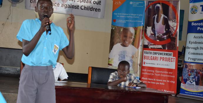 Speakers at the Children's Parliament in Omoro district. Immaculate Nalubyayi / Save the Children