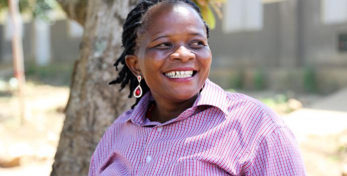 Head teacher Ms Gimbo Harriet at St Kizito school