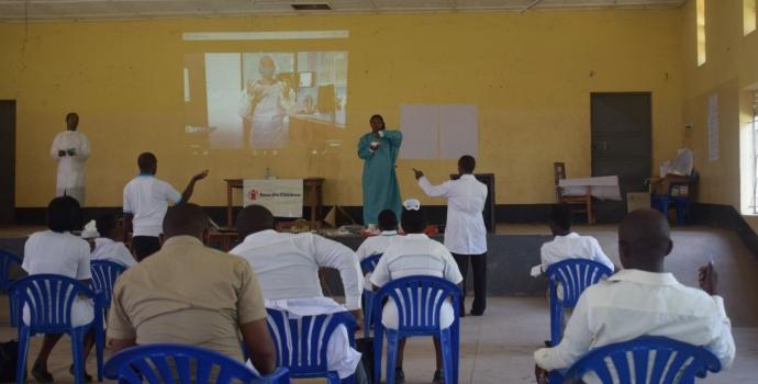 Training health workers in western Uganda on COVID-19. Annet Kabasinguzi / Save the Children