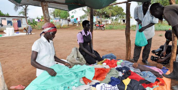 Emma (centre) and her mother at their clothes business