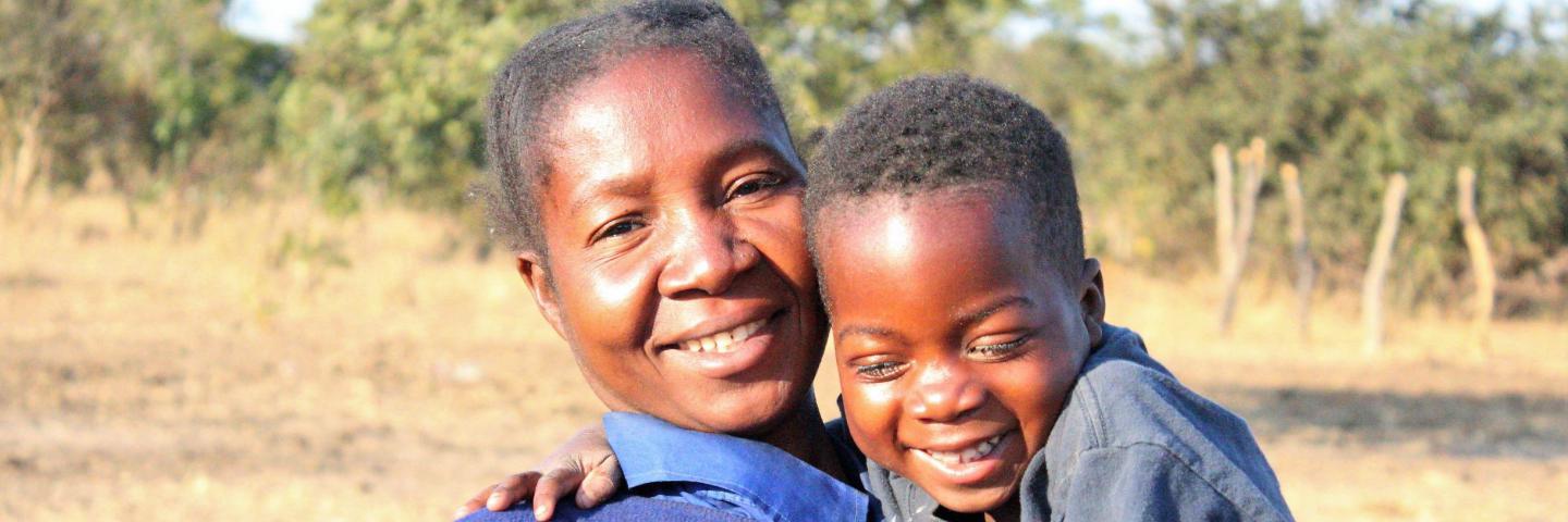 Child with his mother in Kaoma district of western province in Zambia
